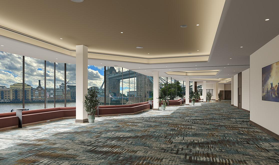 The bridge suite at the Tower hotel featuring a large window that offers a stunning view of Tower Bridge.