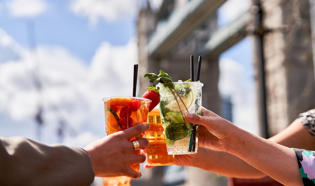 Cocktail cups in a beer garden by Tower Bridge