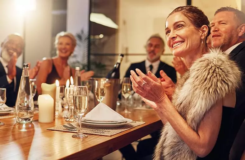 People clapping at an event