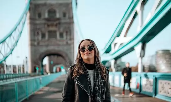 Woman standing on tower bridge